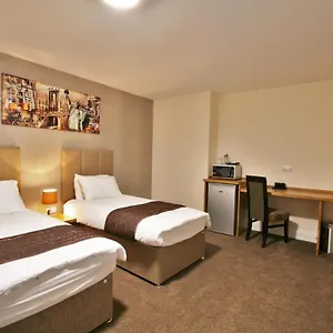 New County & Serviced By Roomsbooked Отель
